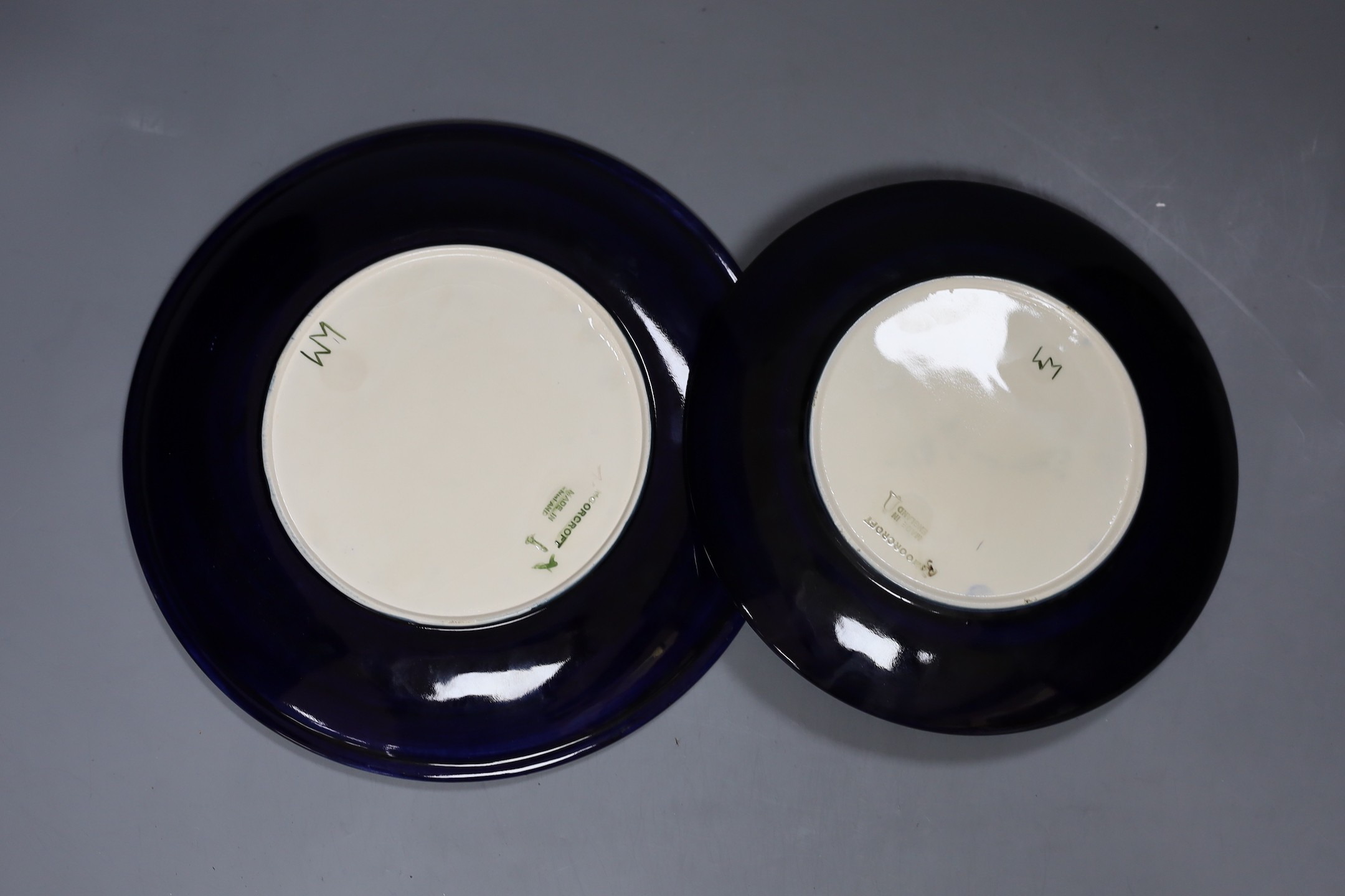 Five Moorcroft pottery dishes and a timepiece